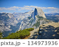 Half Dome Granite Cliffs and Forested Valley from Glacier Point in Yosemite 134973936