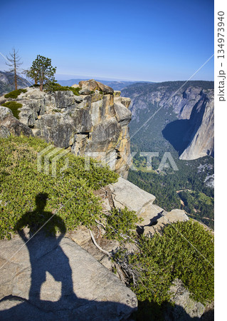 Taft Point Cliff Edge with El Capitan and Human Shadow in Yosemite National Park 134973940