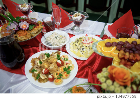 Festive cheese and tomato appetizer display 134977559