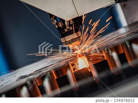 CNC Laser cutting of metal, modern industrial technology. CNC Laser cutting of metal, modern industrial technology. 134978012
