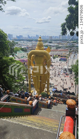 Lord Murugan golden statue stands majestically 134979606