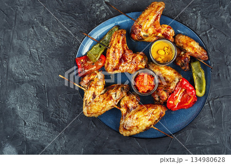 BBQ Chicken Wings on Serving Plate 134980628