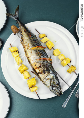 Mackerel and Pineapple Skewers on a Plate 134980630