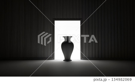 A dramatic, contrasting shot: a black antique vase stands in the foreground of a dark room, illuminated from behind by bright light from an open door. The strict geometry, vertical lines on the walls, 134982069