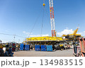 Offshore platform under construction with crane. 134983515