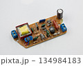 Old electronic component microcircuit closeup. 134984183