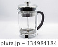 French press tea coffee maker with stainless steel frame closeup. 134984184