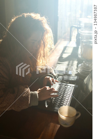 red curly hair beauty girl outdoors at spring season  134987387