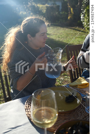 red curly hair beauty girl outdoors at spring season red curly hair beauty girl outdoors at spring season 134987494
