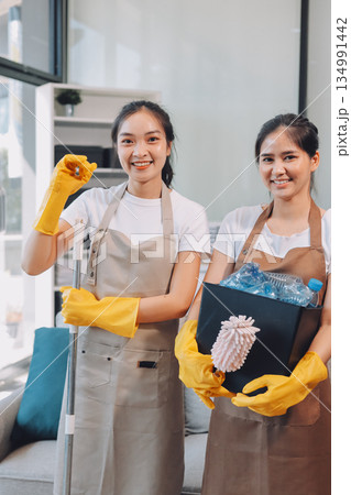 Cleaners clean empty office spaces Cleaners clean empty office spaces 134991442