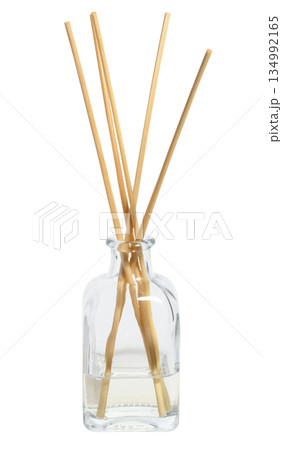 Glass aroma diffuser with wooden sticks on isolated background 134992165