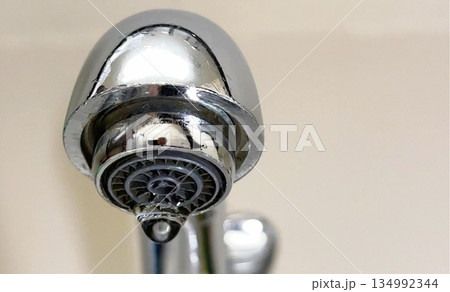 Water Drop From Faucet Aerator 134992344