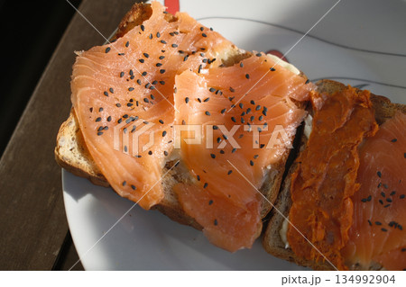 homemade breakfast with bread salmon ham eggs or chocolate in the morning homemade breakfast with bread salmon ham eggs or chocolate in the morning 134992904