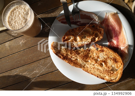 homemade breakfast with bread salmon ham eggs or chocolate in the morning homemade breakfast with bread salmon ham eggs or chocolate in the morning 134992906