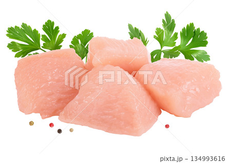 Raw diced chicken fillet isolated on white background with full depth of field. Raw diced chicken fillet isolated on white background with full depth of field. 134993616