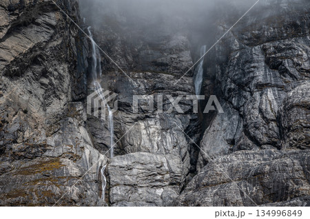 Dramatic landscape of the cliff in the landslide area covering an old Langtang village, Nepal. The 2015 earthquake triggered a catastrophic avalanche and landslide destroyed Langtang village. 134996849