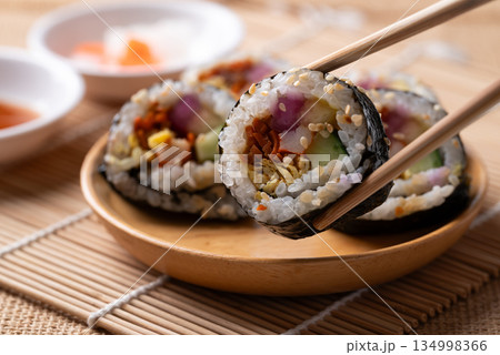 Kimbap, Korean food made from cooked rice with vegetables, egg and wrapped with dried seaweed 134998366