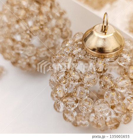 Handmade beaded Christmas ornament made of transparent brown color Handmade beaded Christmas ornament made of transparent brown color 135001655