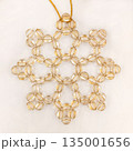 Handmade beaded Christmas ornament made of transparent brown color 135001656