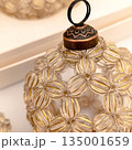 Handmade beaded Christmas ornament made of transparent brown color 135001659