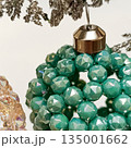 Handmade beaded Christmas ball. Cropped photo 135001662