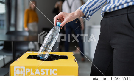 Waste separation and recycling in business office. Waste separation and recycling in business office. 135005536
