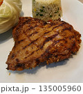 Close-up of succulent grilled marinated pork neck slice 135005960