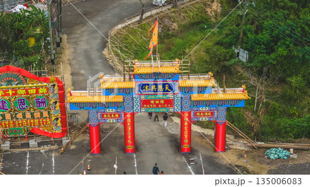 Dec 20 2025 Colorful Festival Arch Over Busy Street, Kam Tin Jiao Festival Dec 20 2025 Colorful Festival Arch Over Busy Street, Kam Tin Jiao Festival 135006083