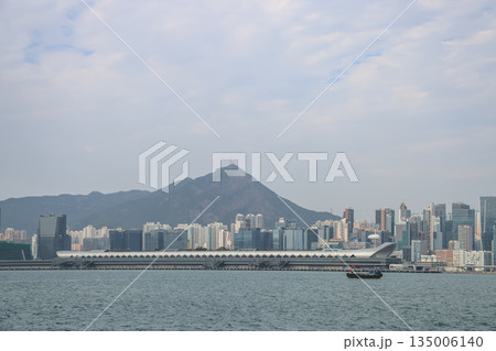 Dec 31 2025 Iconic Kai Tak Cruise Terminal overlooking Victoria Harbour skyline Dec 31 2025 Iconic Kai Tak Cruise Terminal overlooking Victoria Harbour skyline 135006140