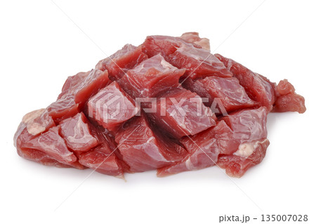 Raw beef stew meat, pre cut into lean chunks isolated on a white background Raw beef stew meat, pre cut into lean chunks isolated on a white background 135007028