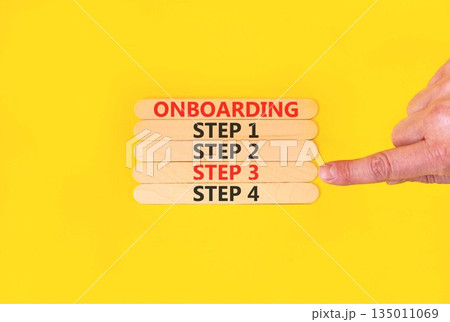 Time to step 3 onboarding symbol. Concept words Onboarding step 3 on beautiful wooden block. Businessman's hand. Beautiful orange background. Business success step 3 onboarding concept. Copy space. Time to step 3 onboarding symbol. Concept words Onboarding step 3 on beautiful wooden block. Businessman's hand. Beautiful orange background. Business success step 3 onboarding concept. Copy space. 135011069