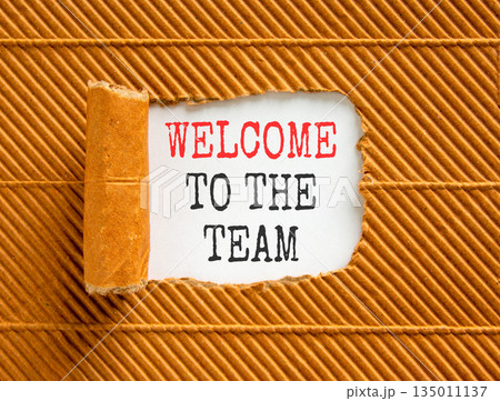 Support, help welcome to the team symbol. Concept words Welcome to the team on beautiful white paper. Beautiful brown paper background. Business welcome to the team concept. Copy space. Support, help welcome to the team symbol. Concept words Welcome to the team on beautiful white paper. Beautiful brown paper background. Business welcome to the team concept. Copy space. 135011137