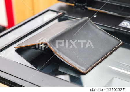 Copying Passport Pages at a Document Copy Center Office Administrative Service Copying Passport Pages at a Document Copy Center Office Administrative Service 135013274