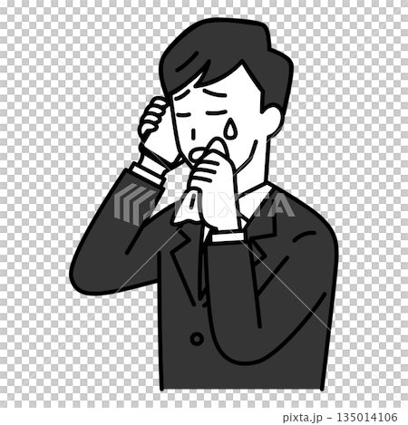 スマホでの会話で泣く喪服の男性 135014106