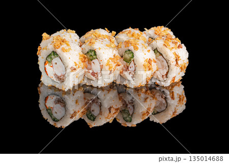 Fried sushi roll with shrimp and cucumber isolated on black background with reflection 135014688