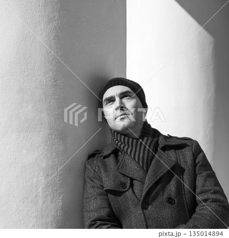 Beautiful young man looking up 135014894