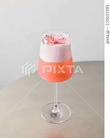 Stylish and sophisticated summer cocktail adorned with rose petals Stylish and sophisticated summer cocktail adorned with rose petals 135015595