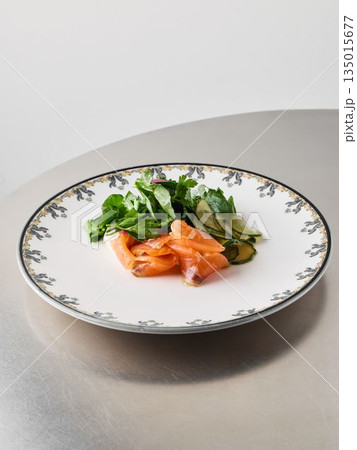 Vibrant brunch display featuring smoked salmon and crisp vegetables Vibrant brunch display featuring smoked salmon and crisp vegetables 135015677