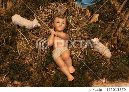 Ceramic figure of a Jesus Christ. Christmas nativity scene Ceramic figure of a Jesus Christ. Christmas nativity scene 135015870