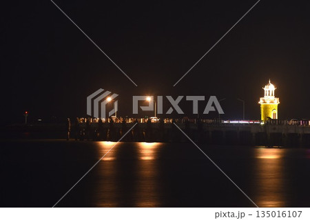 landscape of lighthouse on jetty sea in night at Ang sila beach travel location in Thailand landscape of lighthouse on jetty sea in night at Ang sila beach travel location in Thailand 135016107