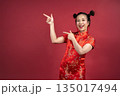 Portrait of enthusiastic woman pointing both hands to side for advertisement Portrait of enthusiastic woman pointing both hands to side for advertisement 135017494