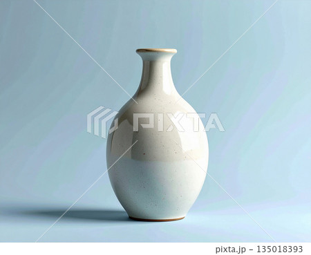 Porcelain. Ceramic vase in beige tones on a white background. Modern minimalist vase. Neutral tones. 135018393