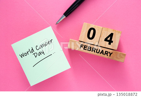 World cancer day reminder on sticky note and calendar World cancer day reminder on sticky note and calendar 135018872