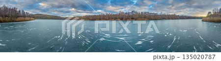 Aerial panorama of frozen lakes and forest near Frankfurt skyline Aerial panorama of frozen lakes and forest near Frankfurt skyline 135020787