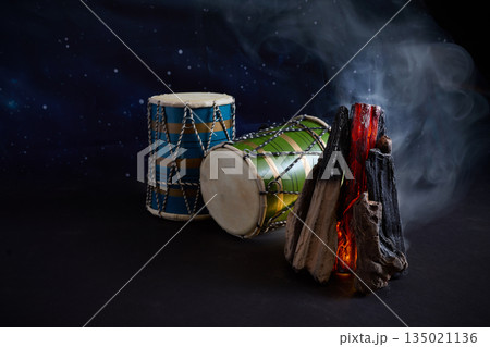 Lohri festival celebrating with dhol drums and bonfire smoke 135021136