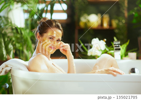 Smiling Bathtub Relaxation with Golden Mask 135021705