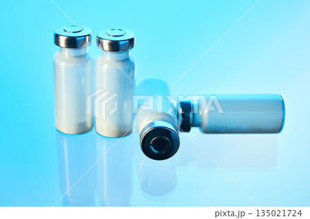 Glass vials containing powdered medicine for healthcare Glass vials containing powdered medicine for healthcare 135021724