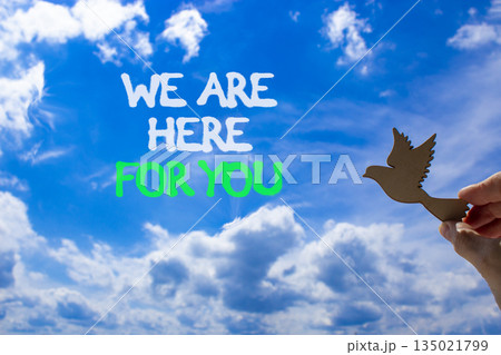 Support, help and we are here for you symbol. Concept words We are here for you on beautiful sky. Beautiful blue sky background. Businessman's hand. Business we are here for you concept. Copy space. Support, help and we are here for you symbol. Concept words We are here for you on beautiful sky. Beautiful blue sky background. Businessman's hand. Business we are here for you concept. Copy space. 135021799