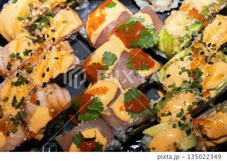 Takeaway sushi rolls with fish rice and shrimp. 135022349