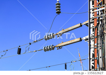High voltage post, High voltage tower, show with high voltage construction and power lines. High voltage post, High voltage tower, show with high voltage construction and power lines. 135022627